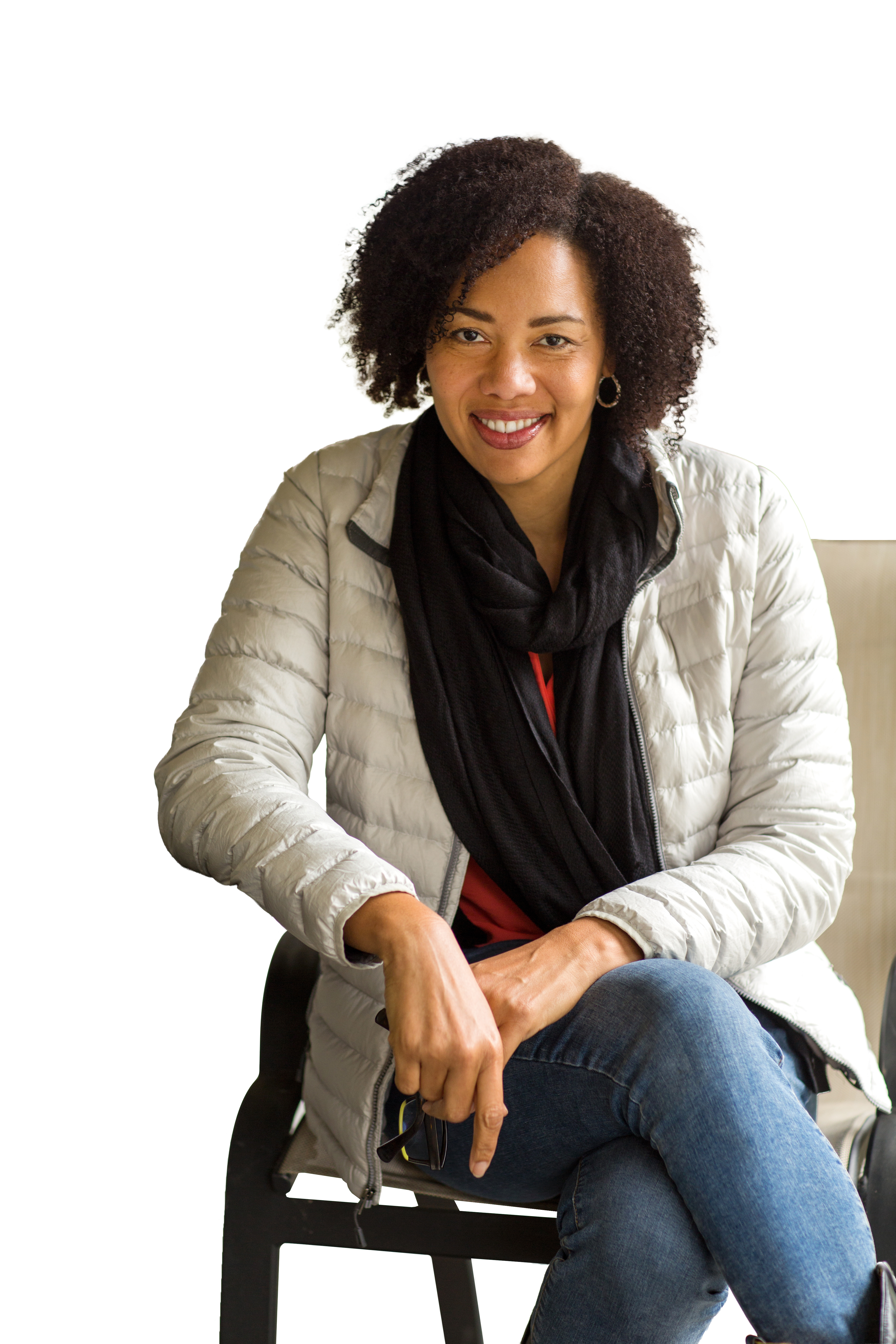 A person looking straight ahead and smiling